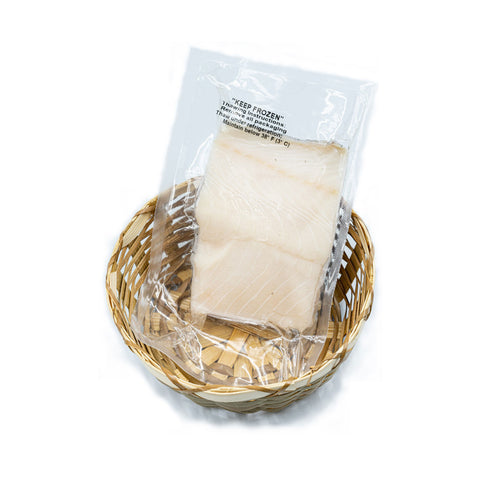 frozen black cod in a basket on white background