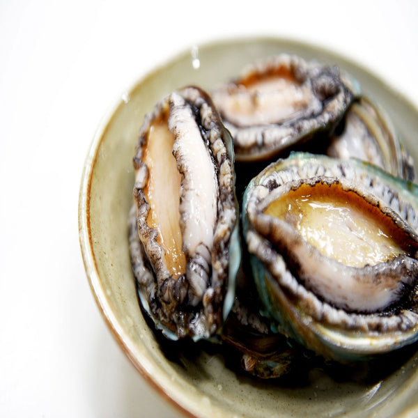 3 korean abalone on bowl