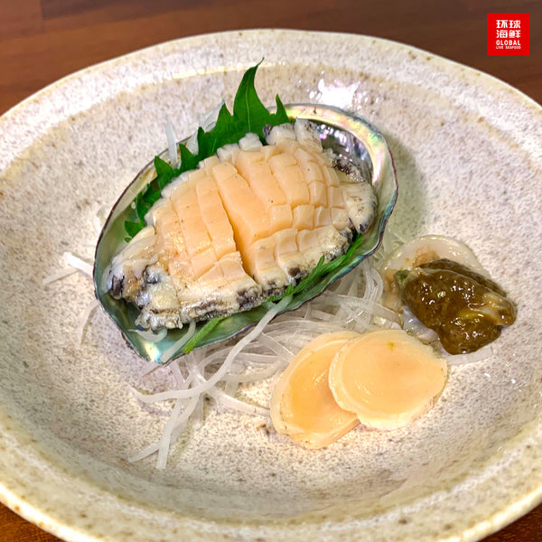 korean abalone sashimi served on plate